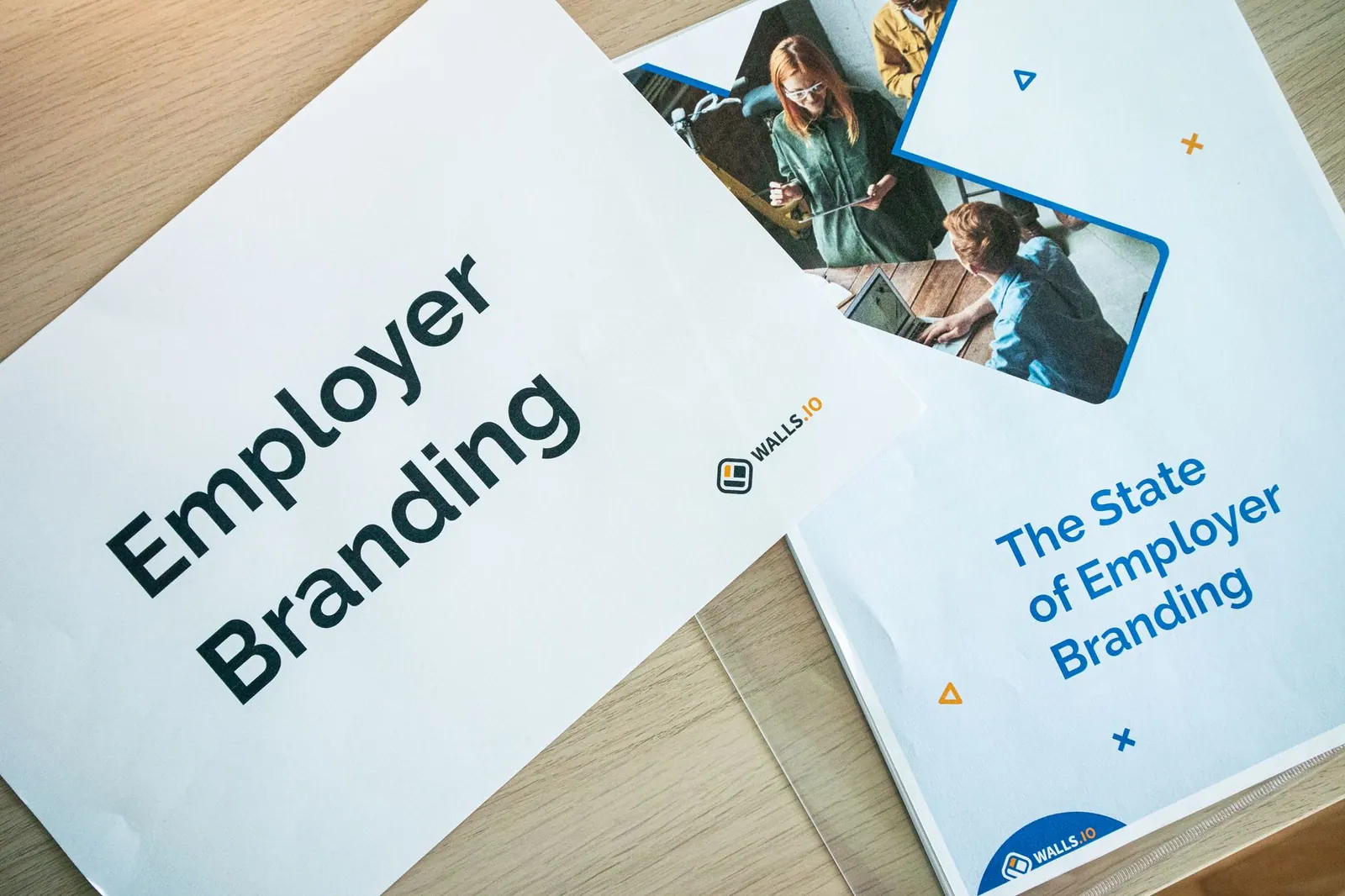 Flat lay of employer branding materials on an office table, showcasing marketing and design. Growth marketing strategy: a practical guide for 2027