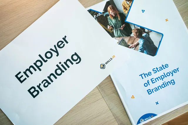 Flat lay of employer branding materials on an office table, showcasing marketing and design. Growth marketing strategy: a practical guide for 2027