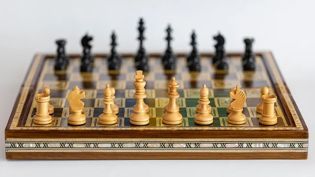 chess game, chess, game, board, blurred, blur, chess pieces, strategic game. Marketing frameworks best practices: keep, merge or retire