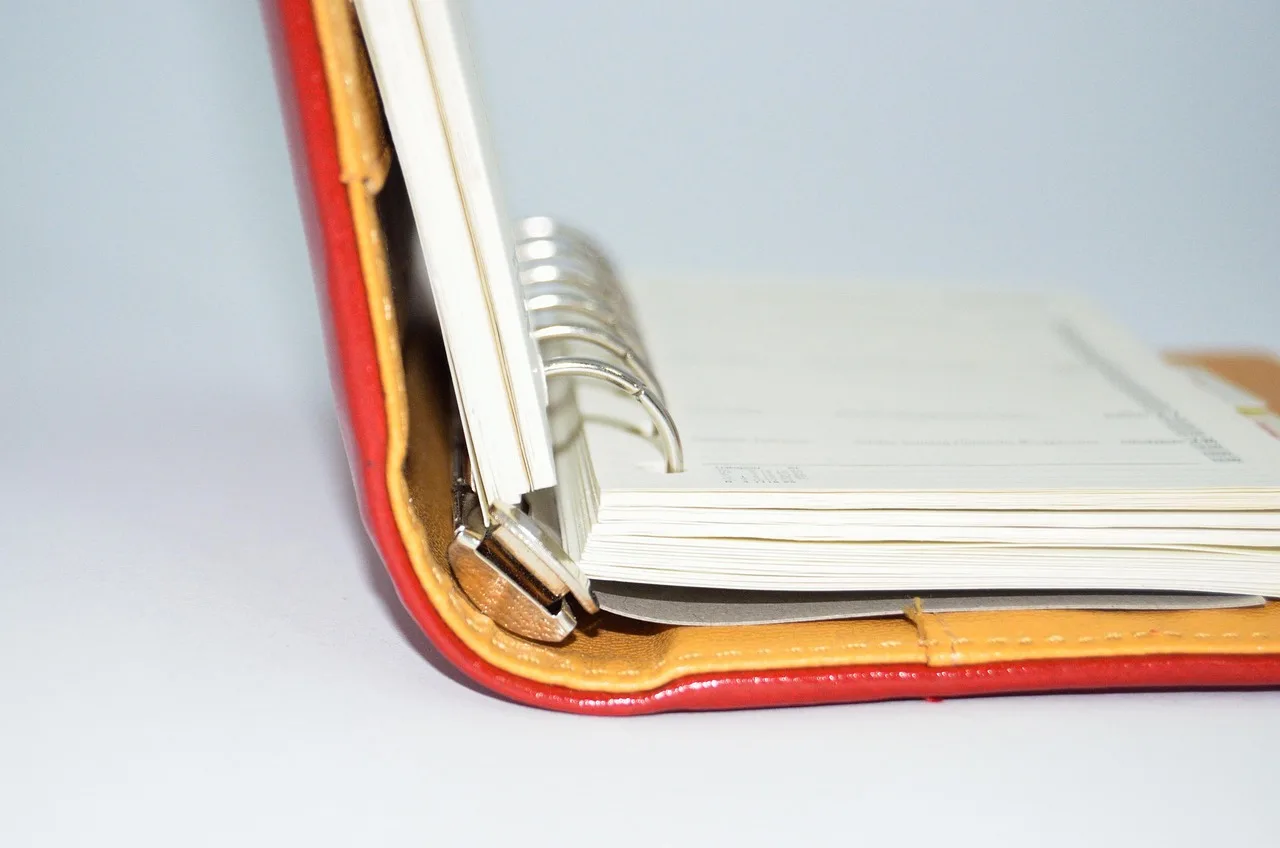 calendar, timetable, notebook, unit, binders, binder folders, notes, pen, time, time management. Marketing planning: the working files behind the plan